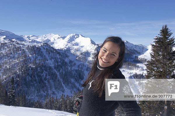 Young woman in snow  smiling