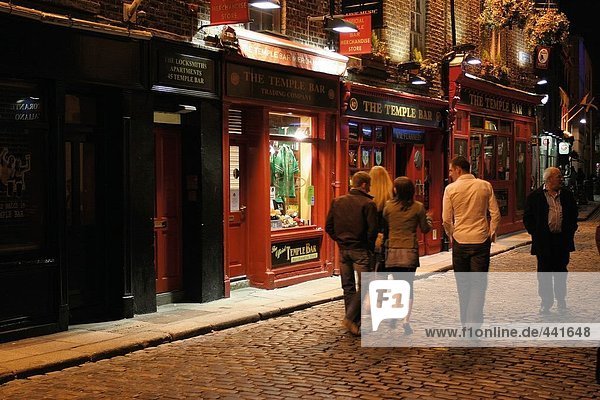 People walking in street in front of bar  Dublin  Republic of Ireland