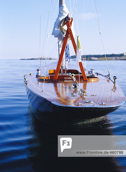 A wooden sailing-boat.