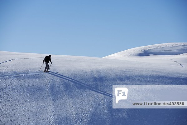 A skier in the Alps.
