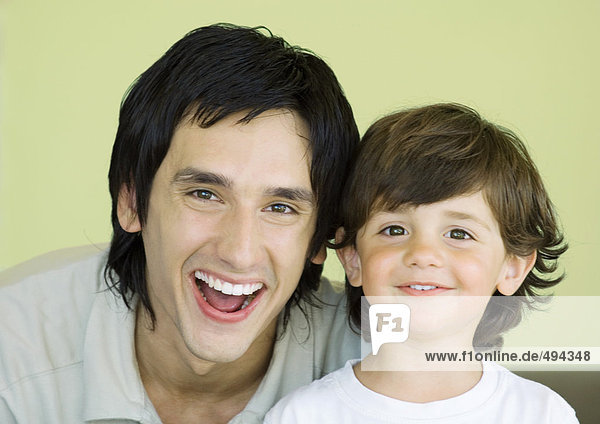 Young man and little boy  portrait