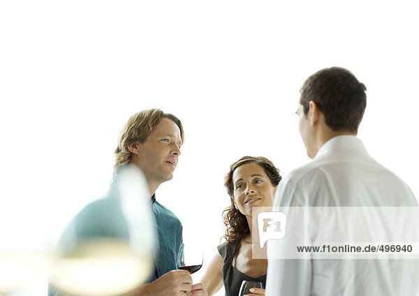 People talking during cocktail party