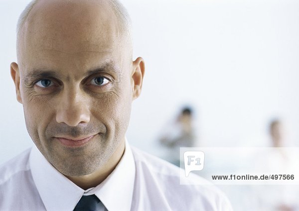 Businessman with shaved head  portrait
