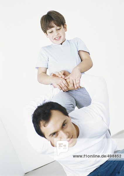 Man playing with son