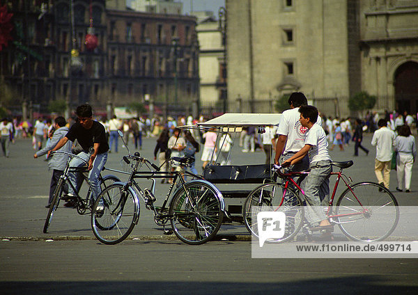 Mexico  people on bicycles in square