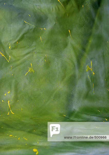 Grüner Stoff mit gelben Flecken  Nahaufnahme  Vollrahmen