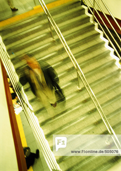 Man on stairs  high angle view  blurred