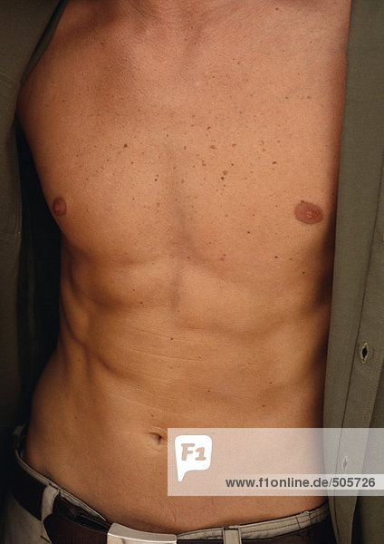 Man's bare chest and abdomen  close-up