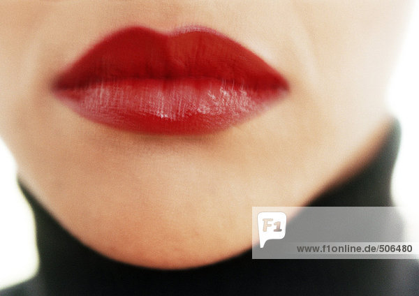 Close up of woman's mouth with red lipstick. mouth