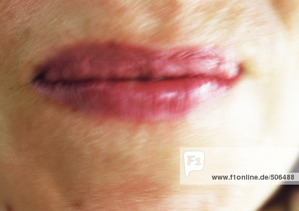 Close up of woman's mouth  blurred mouth