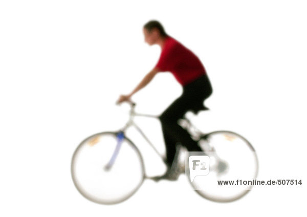 Silhouette of person on bicycle  side view  on white background  defocused