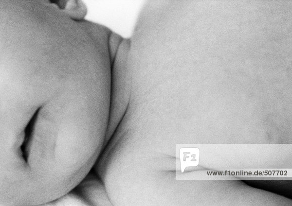 Baby's lower face and chest  close-up  b&w