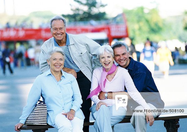 Group of mature people on a bench  portrait