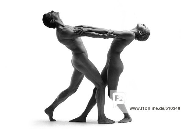 Nude man and woman dancing  side view  b&w