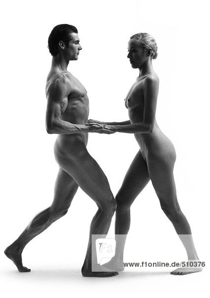 Nude man and woman dancing  b&w