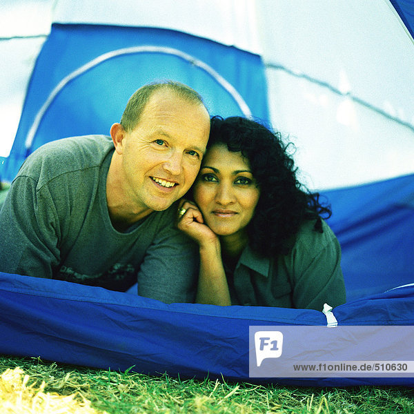 Couple lying tent  portrait