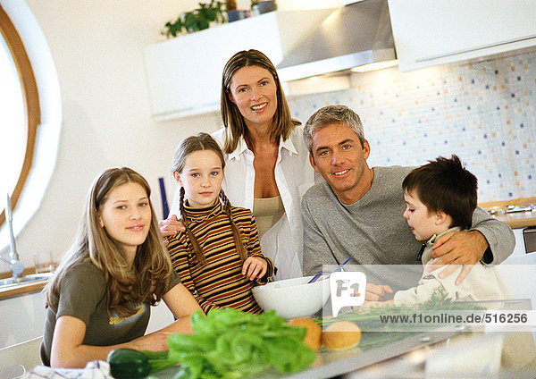 Family in kitchen  portrait
