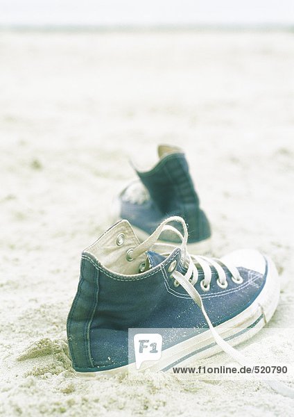 Canvas shoes on beach