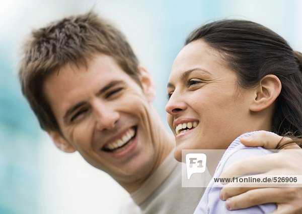 Young couple laughing