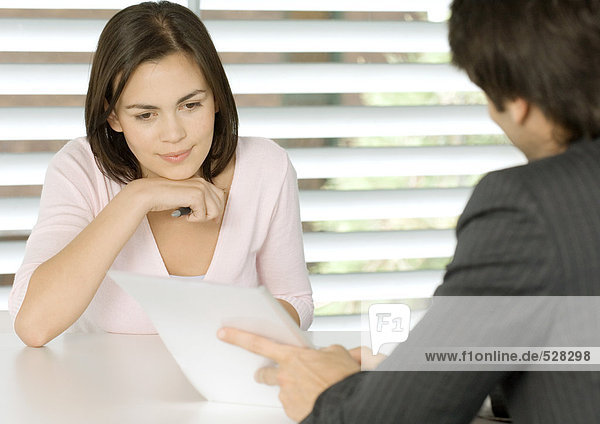 Woman having meeting with businessman