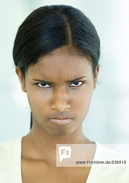 Teen girl frowning  portrait