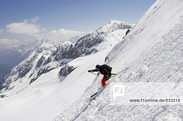 Austria  Tyrol  person telemark skiing