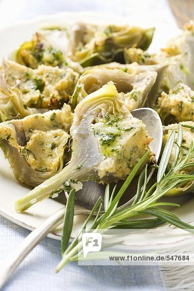 Artichokes with cheese and herb gratin topping