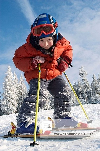 Six year old boy on skis. Winkelmoosalm  Upper Bavaria  Germany