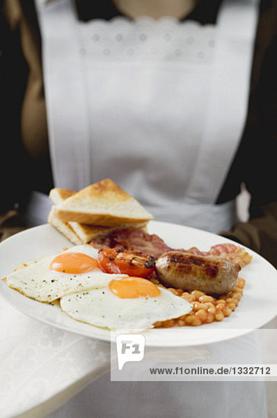 English breakfast with fried eggs and baked beans