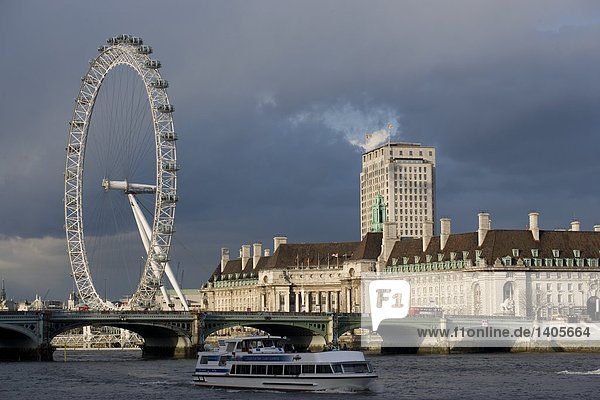 Brdige across river with ferris wheel  Thames River  Millennium Wheel  London  England