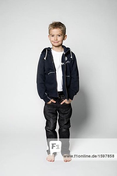 Portrait of a Scandinavian boy with his hands in his pockets Sweden.