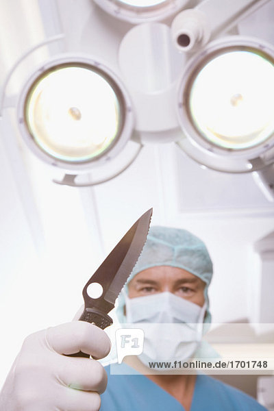 Chirurg mit Chirurgenmesser