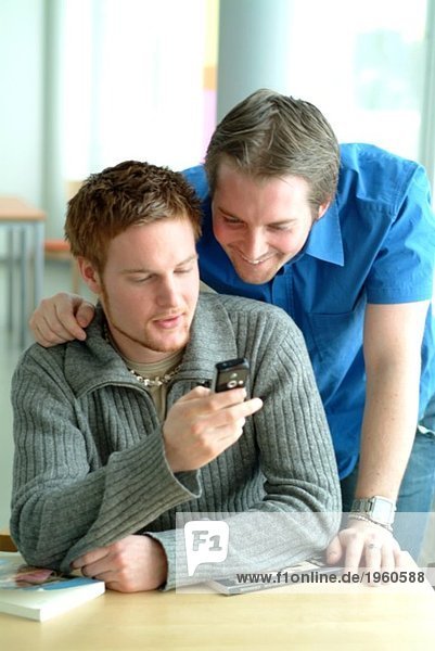 Two guys and a phone