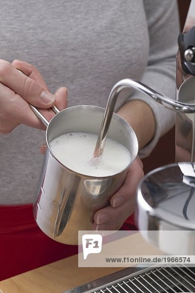 Frothing milk with espresso machine