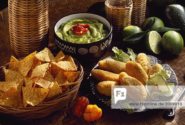 Mexican menu: red pepper fritters and guacamole