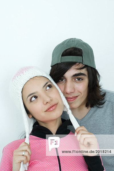 Young couple wearing hats  portrait