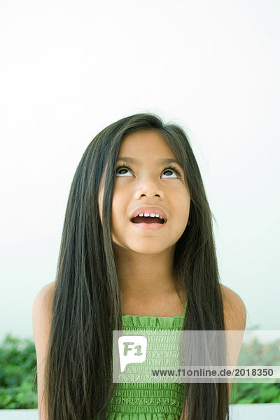 Girl looking up  open mouth  portrait