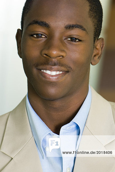 Young male smiling at camera  portrait