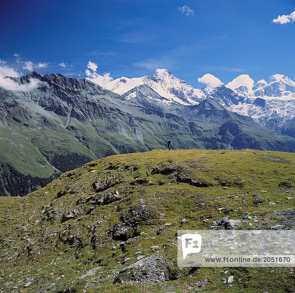 10505050  walking  hiking  man  mountain wandering  remote  alp  Switzerland  Europe  Valais  Corne de Sorebois  mountain panora
