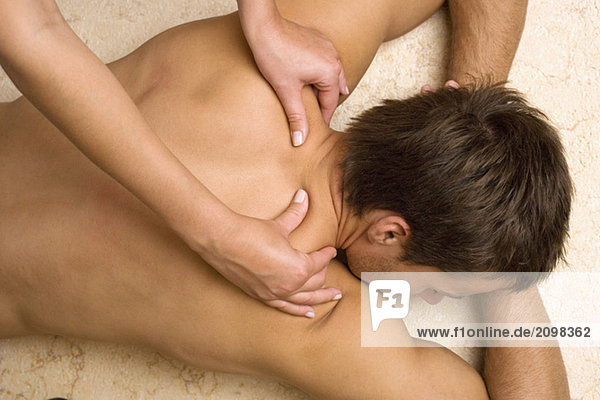 Germany  man receiving massage  close-up