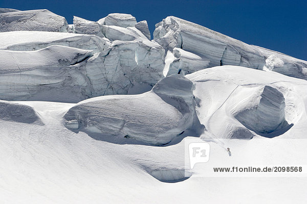 Austria,  Tyrol,  Pitztal man snowbording on glacier