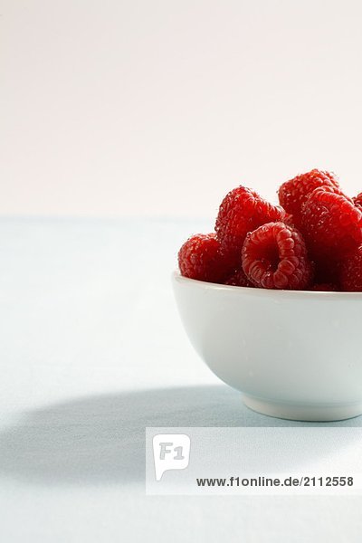 side view  bowl of raspberries