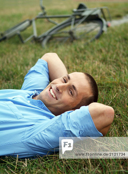 Man lying on a field