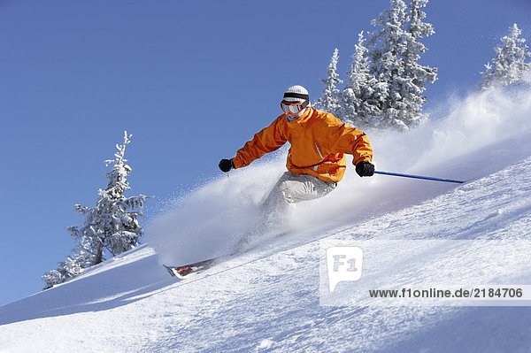Austria  Saalbach  man skiing down slope