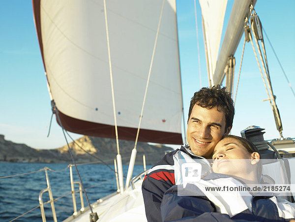 Young couple on relaxing on yacht  portrait