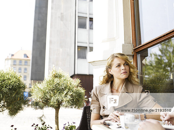 Woman at an outdoor restaurant