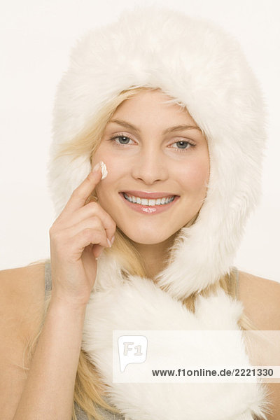 Young woman wearing a fur cap  portrait