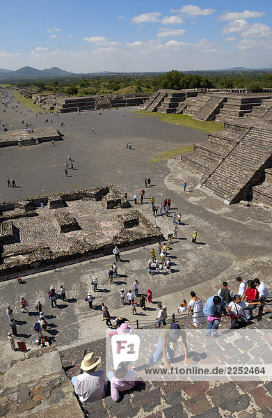 High angle view of tourists on steps of pyramid