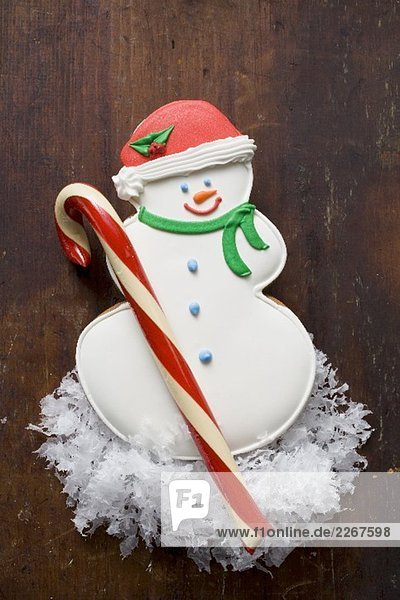 Snowman biscuit and candy cane
