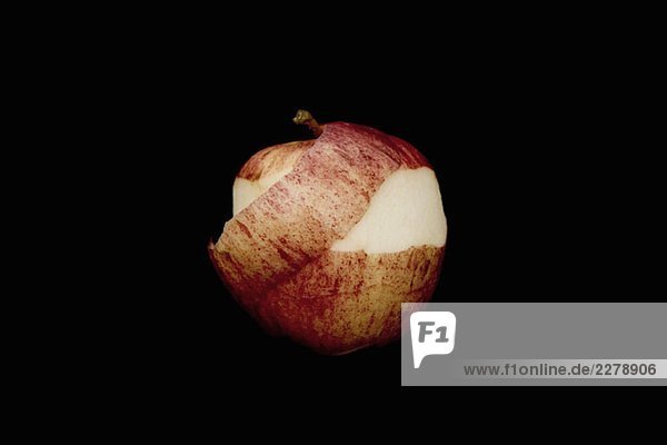 Ein Apfel und seine Schale